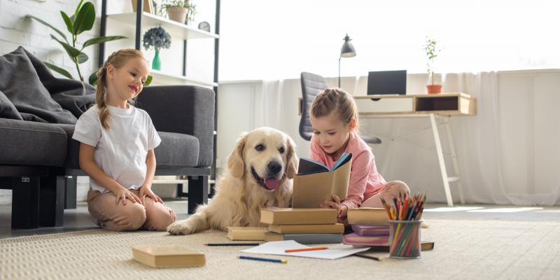 two girls and dog in pest-free home
